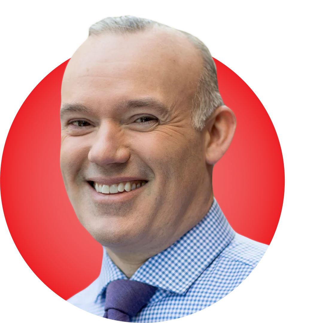 Headshot of Scott Blandford on a red circular background.
