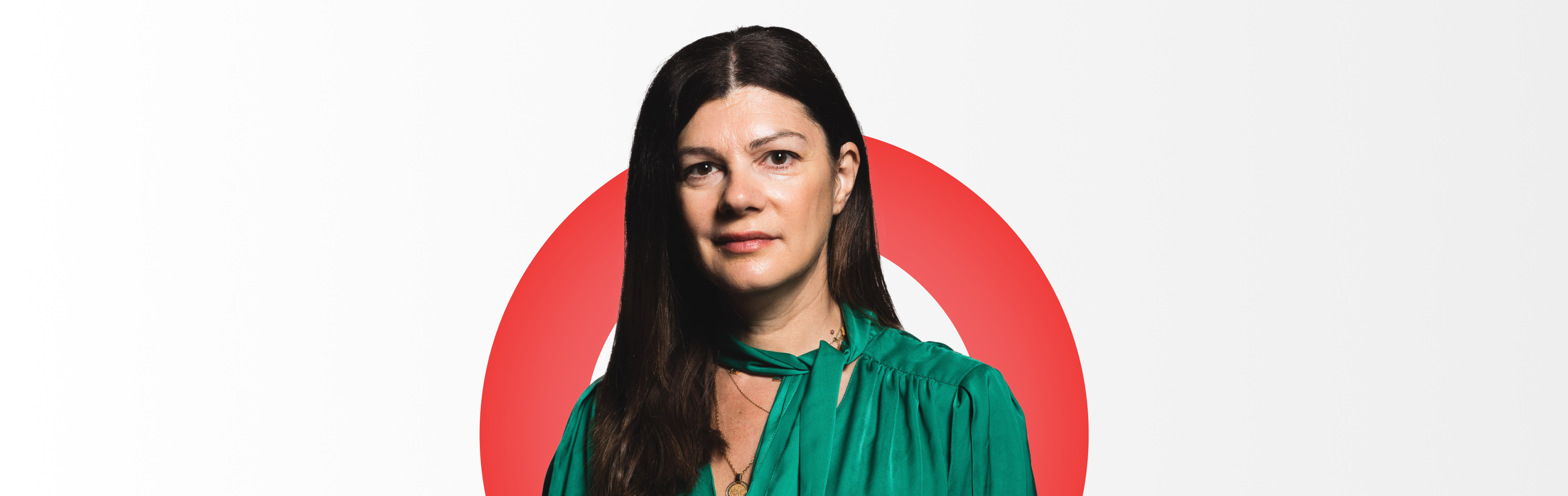 A corporate headshot of Anastasia Georgiou, Director of Client Solutions for the Advisor Segment at Morningstar, wearing a green dress.