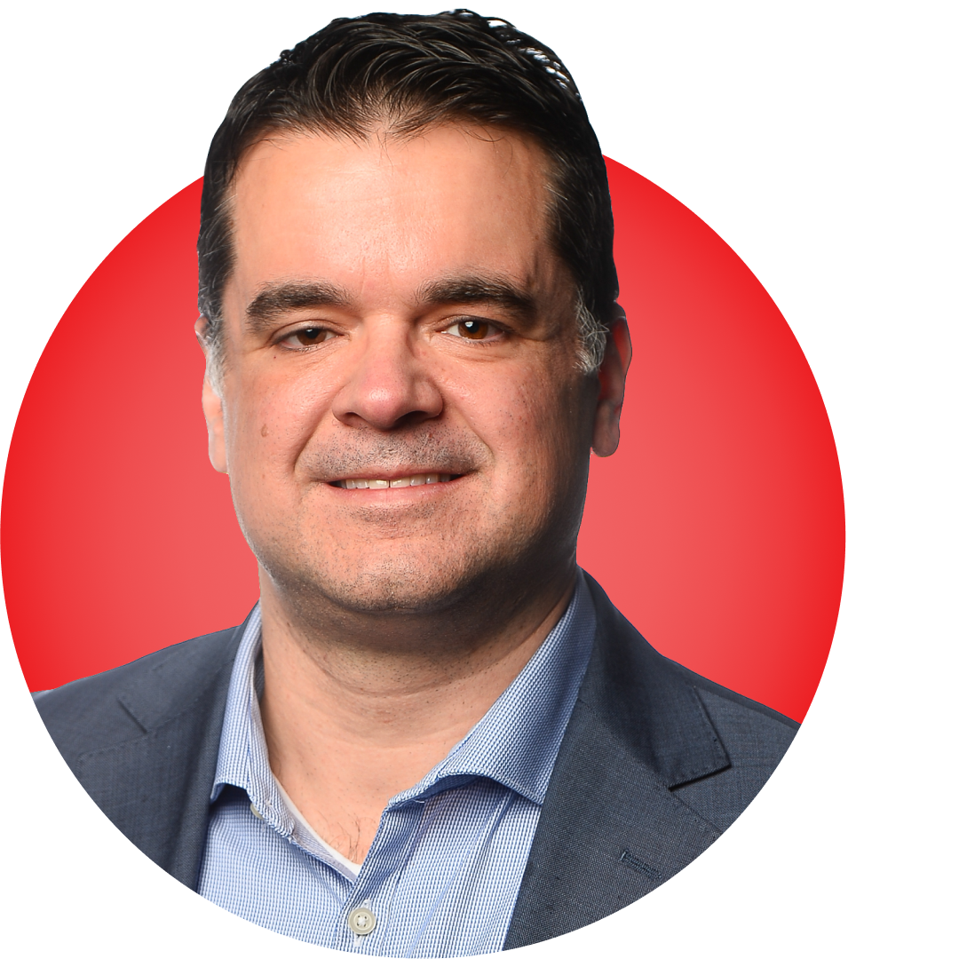Headshot of Andrew Pennington on a red circular background.